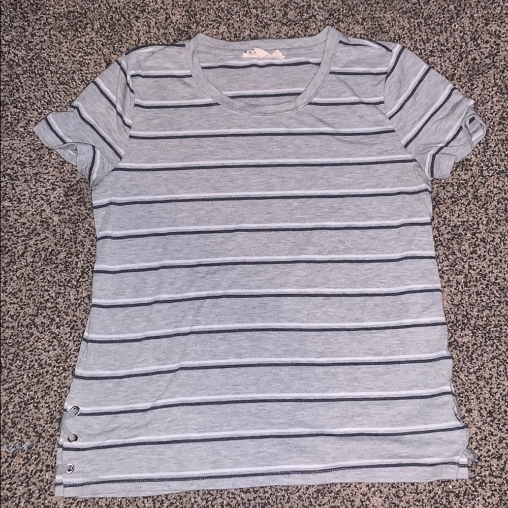 A medium striped shirt laced up on both sides.